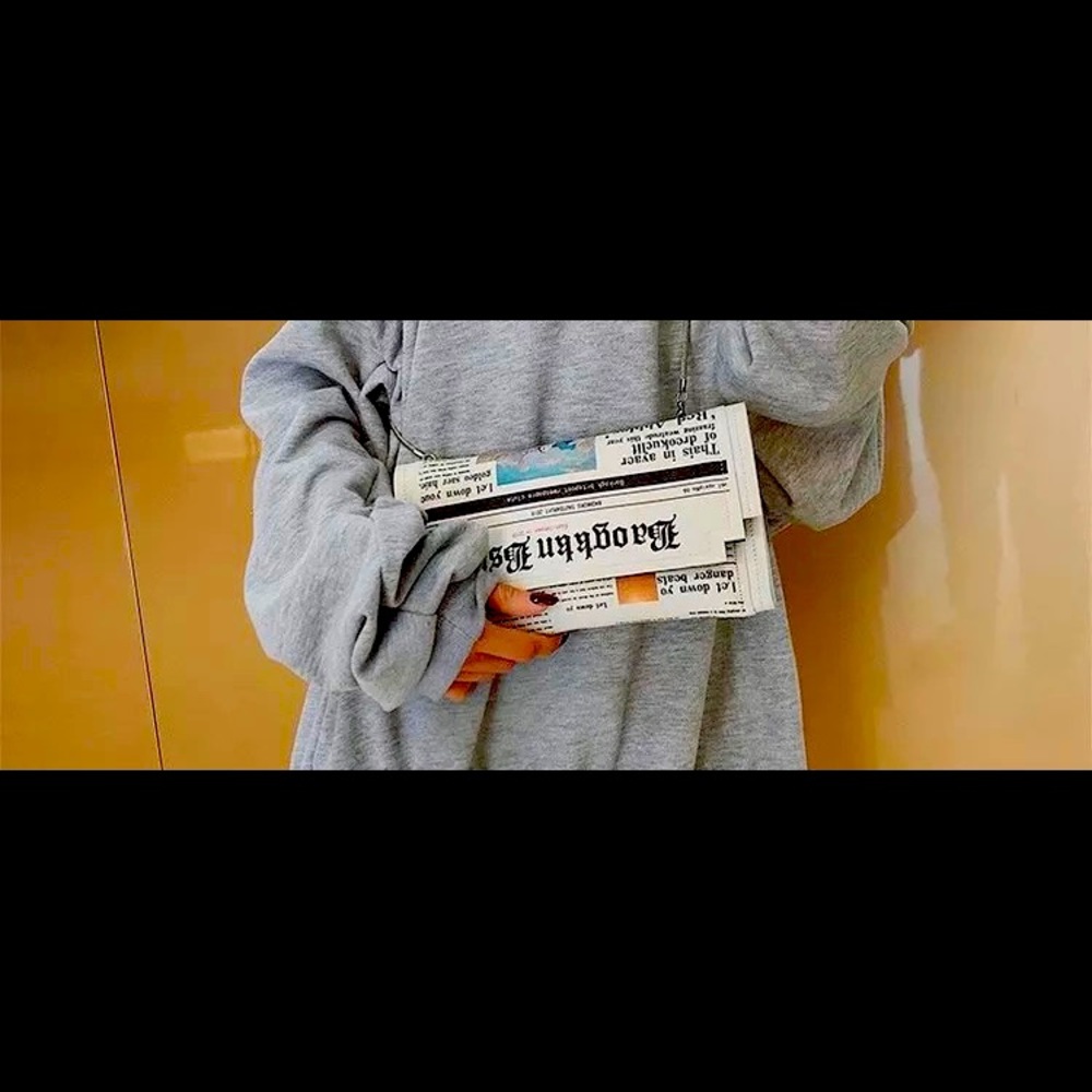 The newspaper clutch